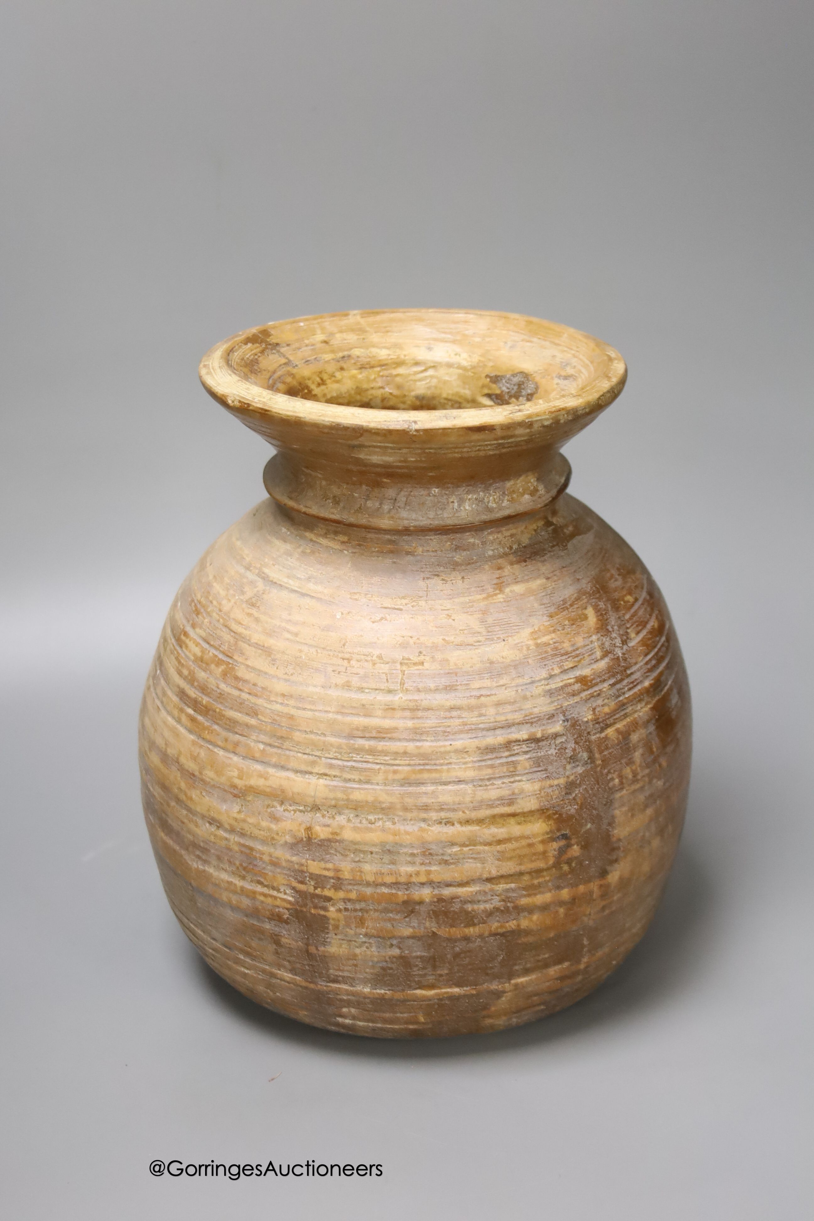 A 17th century continental Tiger ware Bellarmine, 23cm, together with a two handled earthenware bowl, a turned wood bowl and a cylindrical stoneware flask